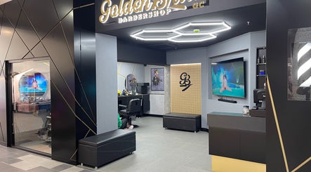 Interior of Goldenblade GC Barbershop in Surfers Paradise, Queensland, AU showcasing modern design and luxurious setup.