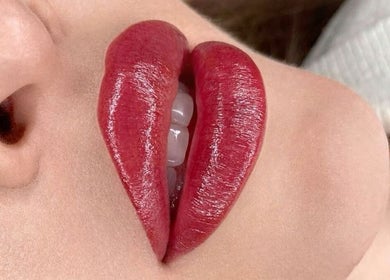 Close-up of glossy red lips at Oh Honey Beauty, Subiaco, Western Australia, AU.