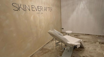 Elegant treatment room at Skin Ever After Ltd, London, England, GB, featuring a plush recliner under soft lighting.