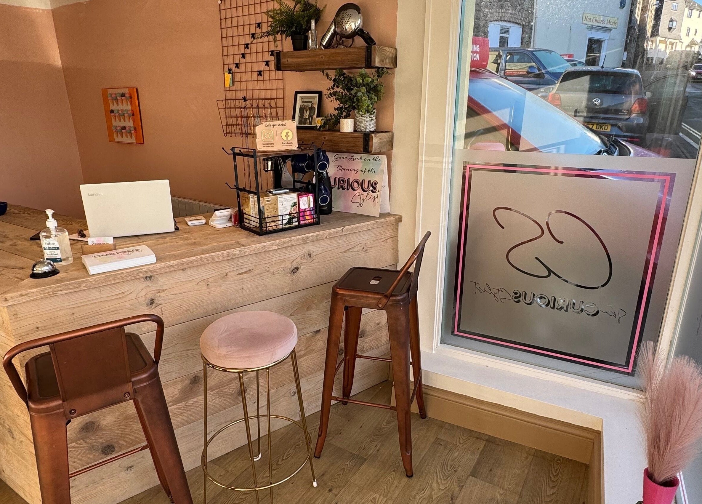 Welcoming reception at The Curious Stylist with rustic decor in Bovey Tracey, England, GB.