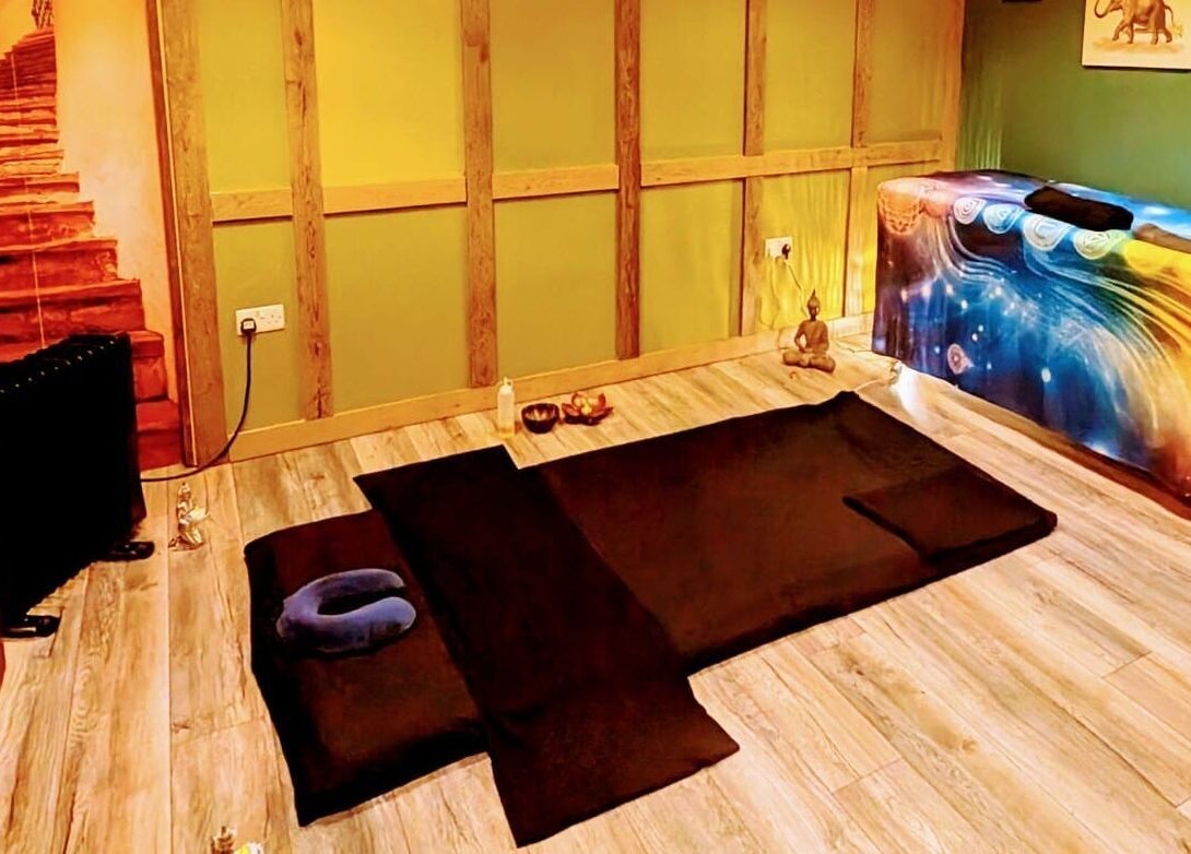 Tranquil therapy room at Balance and Heal, Royston, England, GB, featuring a colorful therapy table and meditation mat.