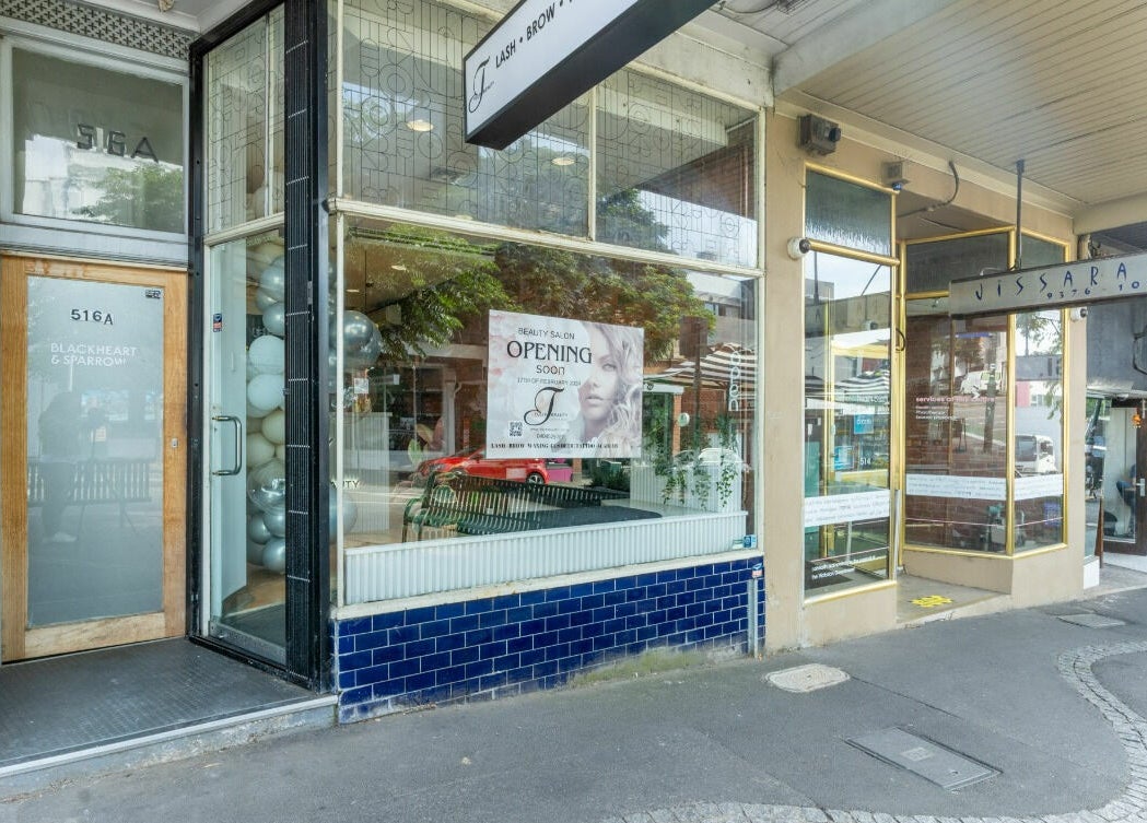 Tulip Beauty Lash and Brow front view in Melbourne, Victoria, AU showcasing a stylish entrance with a beauty poster.
