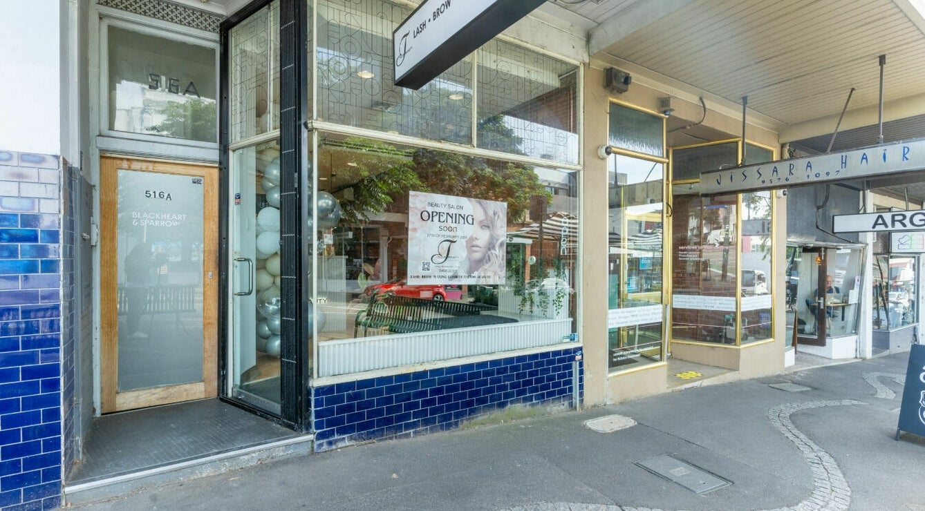 Tulip Beauty Lash and Brow front view in Melbourne, Victoria, AU showcasing a stylish entrance with a beauty poster.