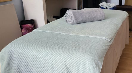 Relaxing massage table at Aurora Massage Spa, Jezreel, Saint Philip, BB, ready for a rejuvenating session.
