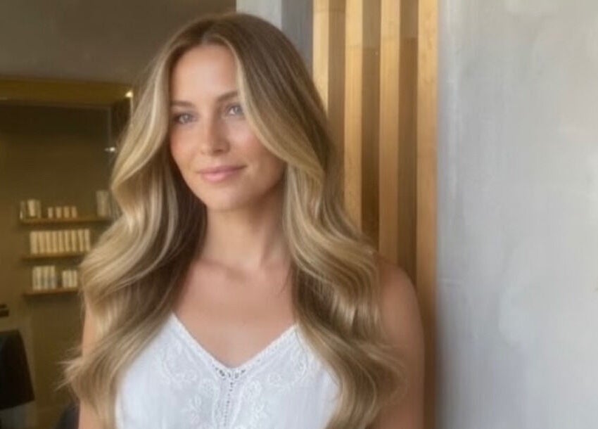 Woman with styled hair at Nikola Krstev Salon in Wollongong, New South Wales, AU.