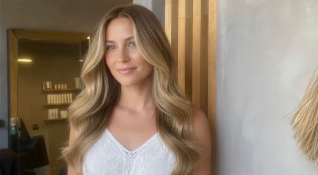 Woman with styled hair at Nikola Krstev Salon in Wollongong, New South Wales, AU.