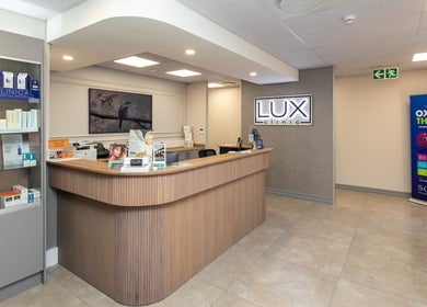 Lux Clinic reception in Johannesburg, Gauteng, ZA featuring modern design and wellness products.
