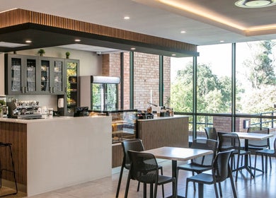 Lux Clinic café with modern decor in Johannesburg, Gauteng, ZA offering a serene relaxation space.