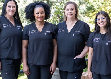 Lux Clinic staff in uniform, Johannesburg, Gauteng, ZA, showcasing professional team.