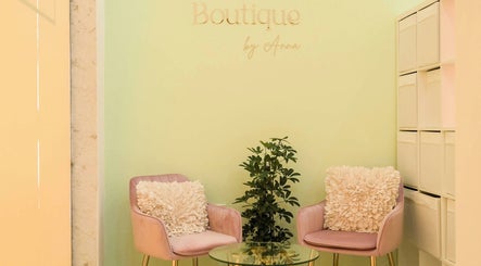Chic seating area in Facial Boutique by Anna, Doha, Doha Municipality, QA featuring plush chairs and decor.