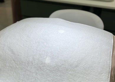 Luxurious treatment bed at Facial Boutique by Anna, Doha, Doha Municipality, QA, elegantly prepared with fresh linens.