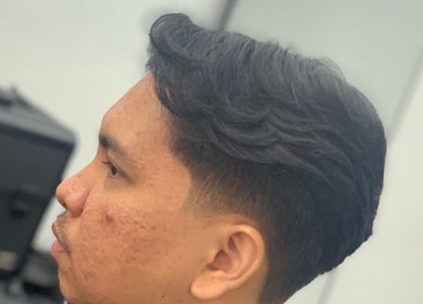 Close-up of a stylish men's haircut at THE CUT ONE, Klang, Selangor, MY.