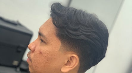 Close-up of a stylish men's haircut at THE CUT ONE, Klang, Selangor, MY.