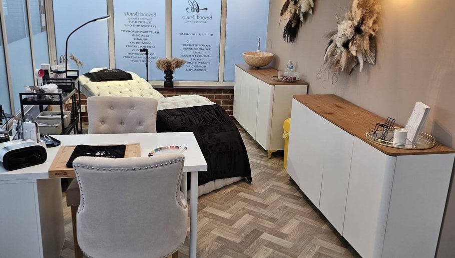 Cozy treatment room at Skin By Shukri, Sheffield, England, GB. Features comfortable chair and modern decor.