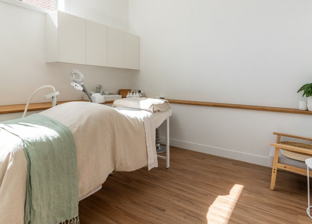 Peaceful therapy room at Fresh Face Skin in Melbourne, Victoria, AU with a treatment bed and calming decor.