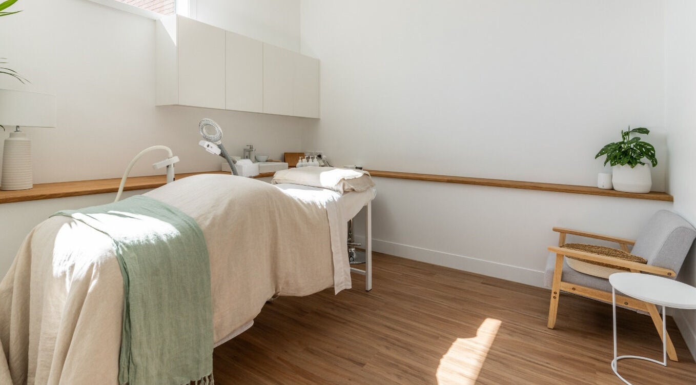 Peaceful therapy room at Fresh Face Skin in Melbourne, Victoria, AU with a treatment bed and calming decor.