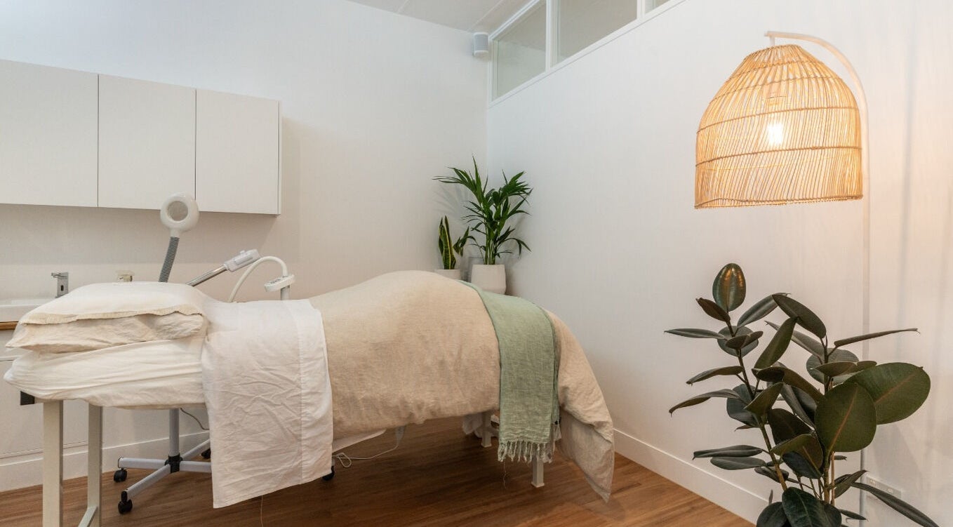 Peaceful treatment room at Fresh Face Skin in Melbourne, Victoria, AU with cozy bed and ambient lighting.