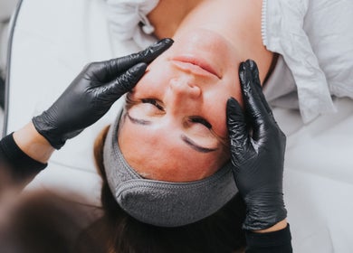 Client enjoys facial massage at Laura Sedge Beauty & Cosmetics, Morecambe, GB, enhancing relaxation and skincare.