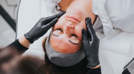 Client enjoys facial massage at Laura Sedge Beauty & Cosmetics, Morecambe, GB, enhancing relaxation and skincare.