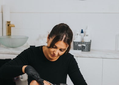 Expert stylist at work in Laura Sedge Beauty & Cosmetics, Morecambe, GB, offering professional beauty services.