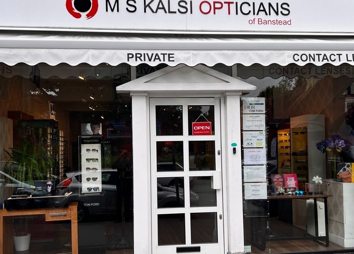 Front entrance of M S Kalsi Opticians - Banstead, showcasing eyewear displays in Banstead, GB.