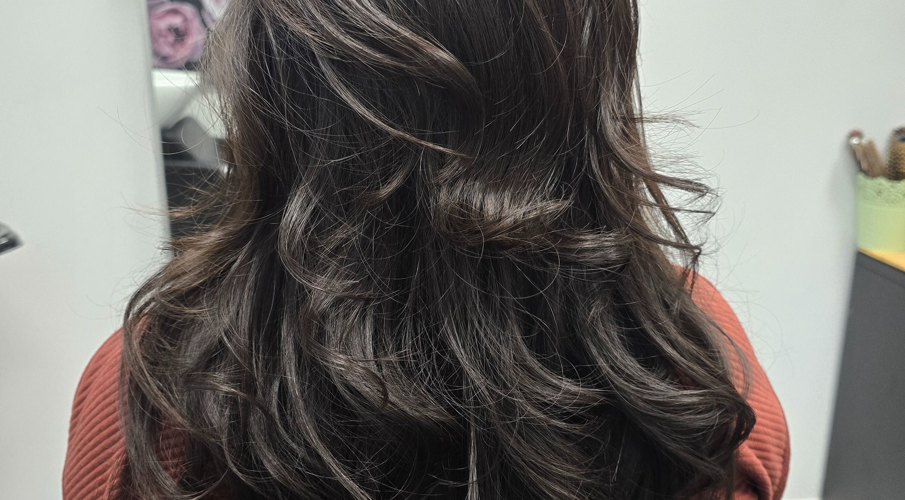 Luxurious wavy hairstyle at Eternal Young Salon, Calgary, Alberta, CA.