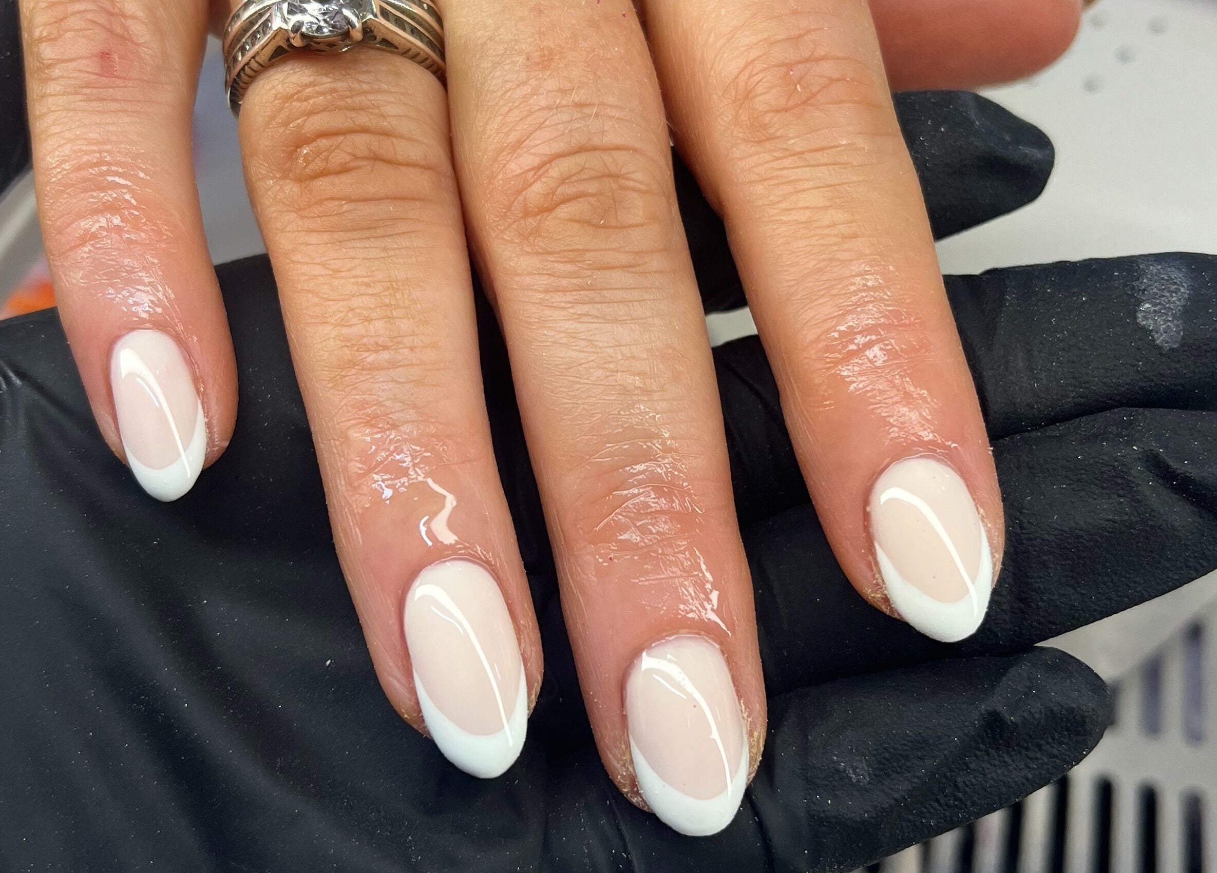 Elegant ivory nails finished at Nails by Ciara Prout, Thurles, County Tipperary, IE. Chic and stylish design.