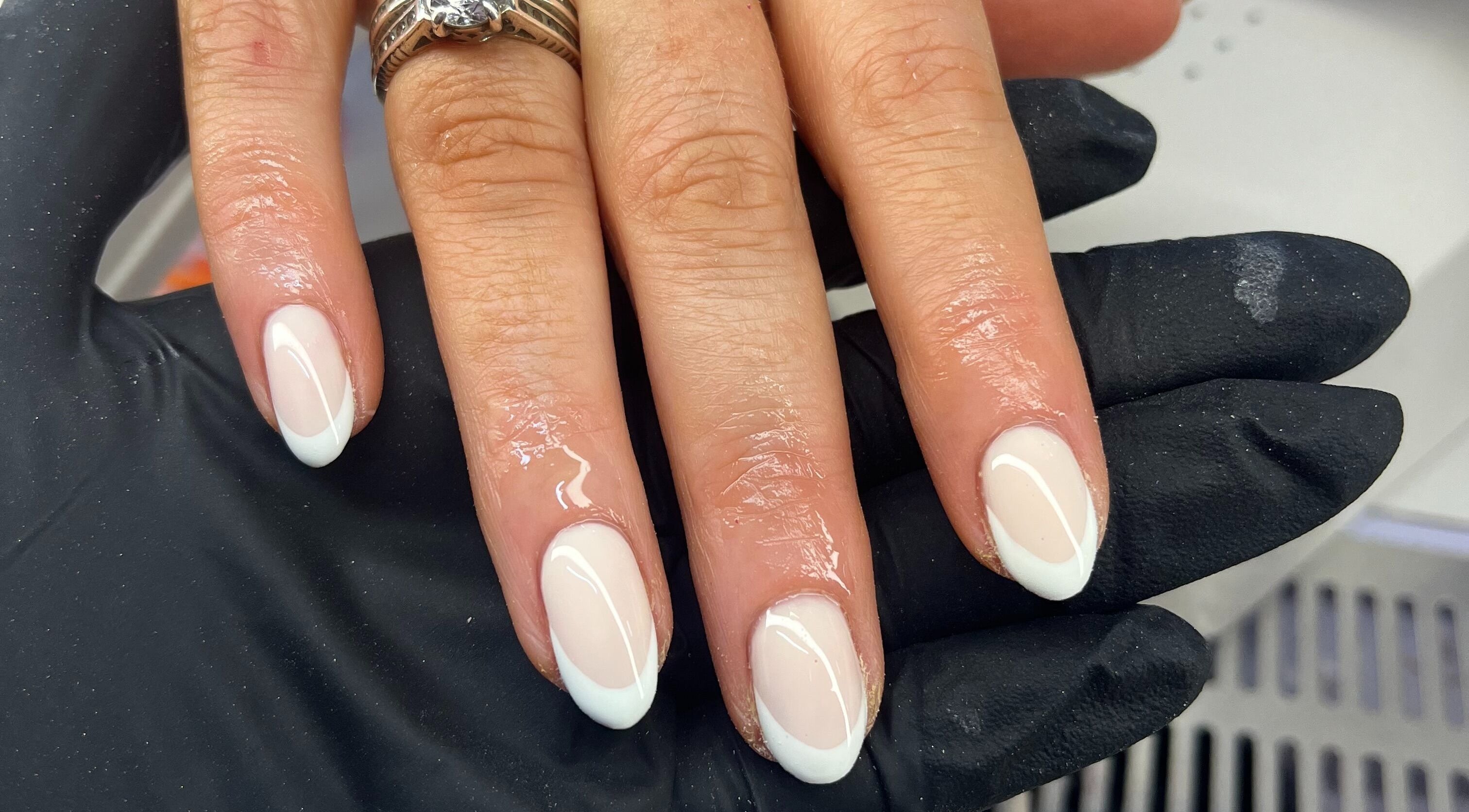 Elegant ivory nails finished at Nails by Ciara Prout, Thurles, County Tipperary, IE. Chic and stylish design.