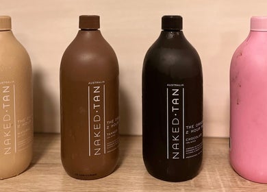 Naked Tan bottles on display at Good Times & Tan Lines, Runaway Bay, Queensland, AU.