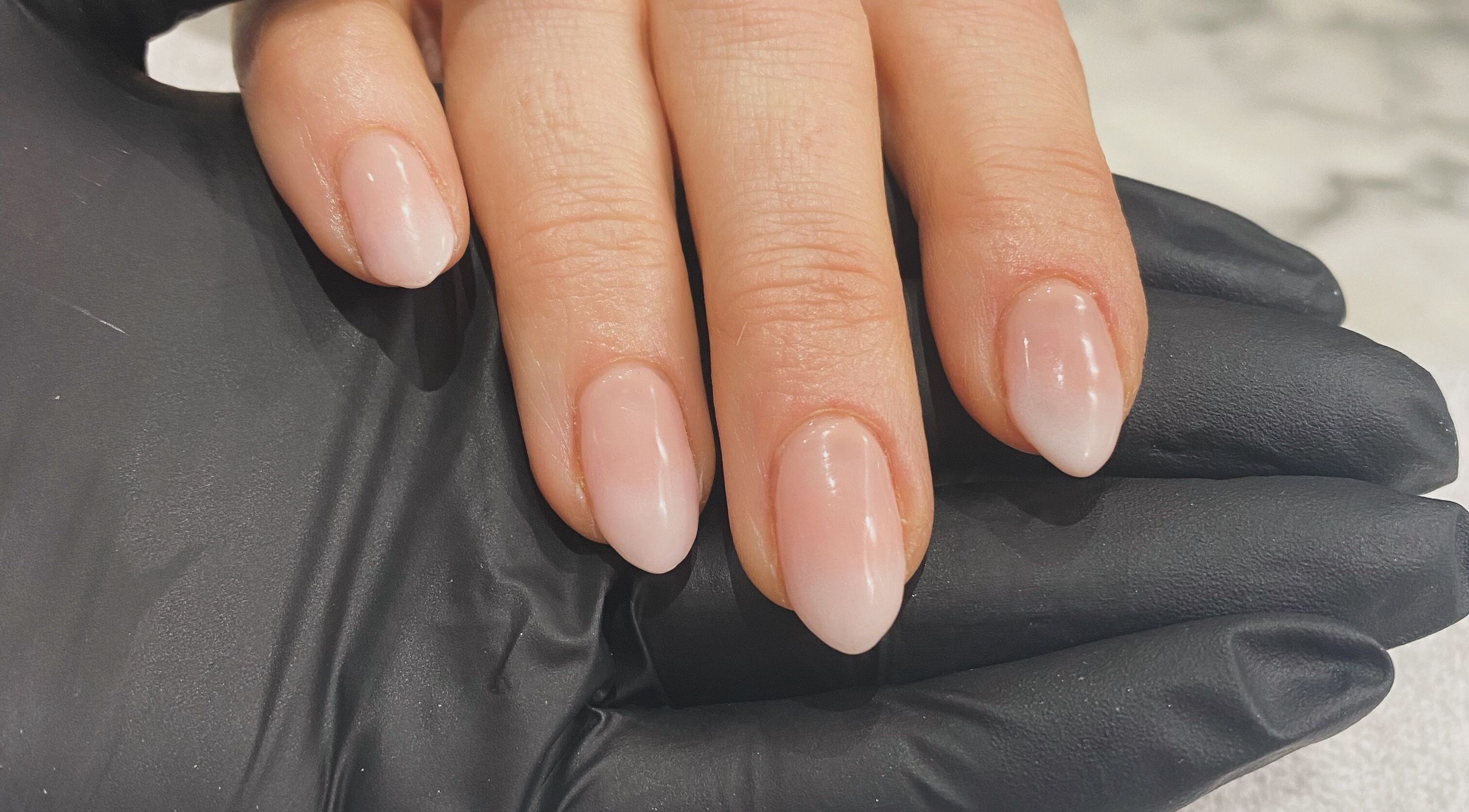 Manicured nails with elegant polish at IrreSiStible Hair & Beauty, Exeter, England, GB.
