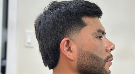 Close-up of sleek taper haircut at Charro Barber, Montebello, California, US.