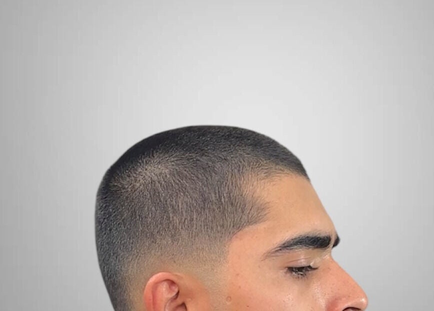 Close-up of a sleek faded haircut at Charro Barber, Montebello, California, US.