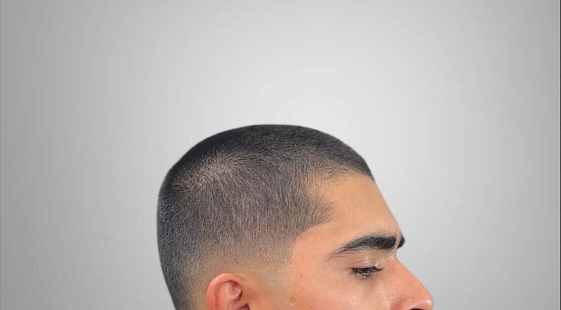 Close-up of a sleek faded haircut at Charro Barber, Montebello, California, US.