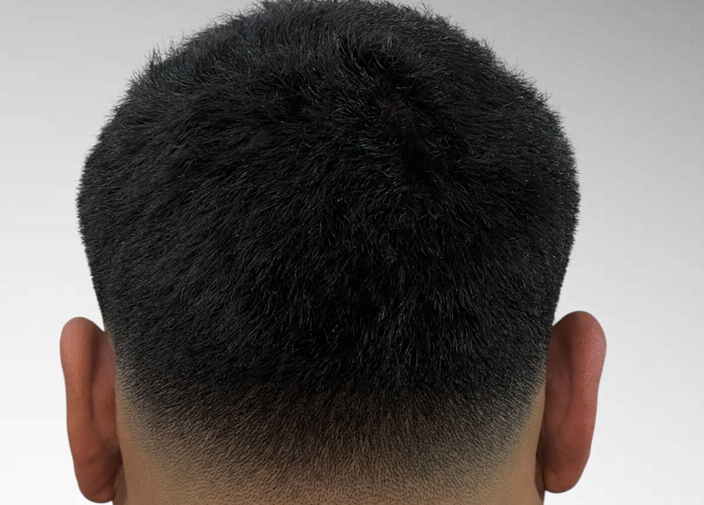 Close-up of a modern fade haircut at Charro Barber in Montebello, California, US.