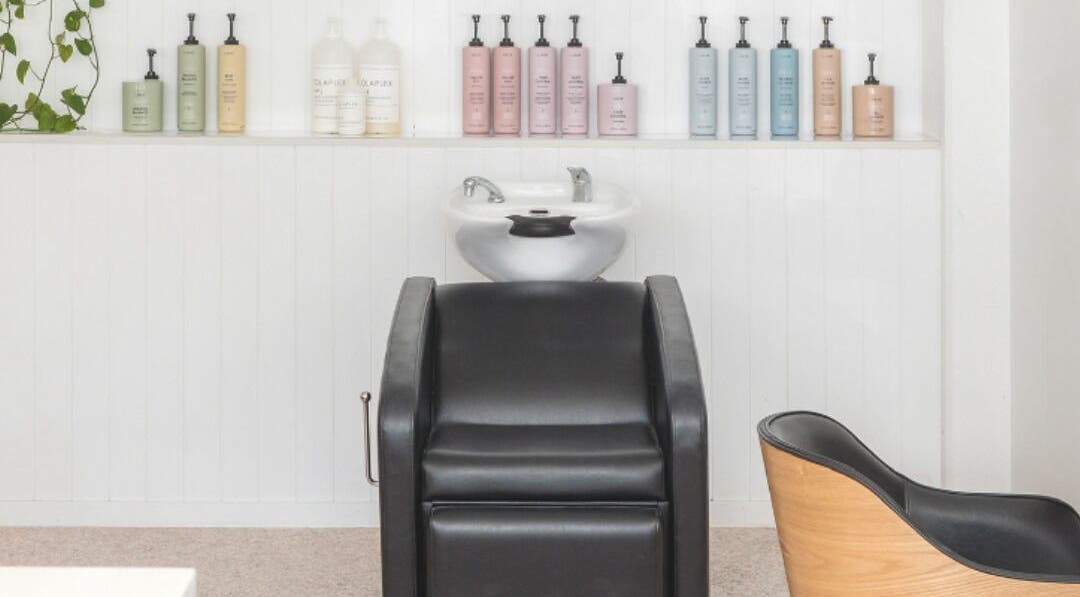 Elegant hair wash station with products at Stellar Salon, Coolangatta, Queensland, AU.