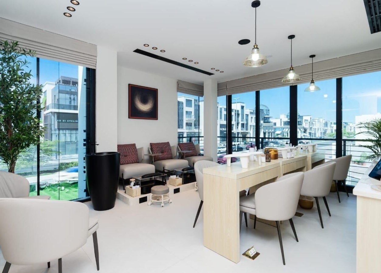 Chic interior of Huracan By Amel - Ladies salon in Dubai, Dubai, AE with stylish seating and decor.