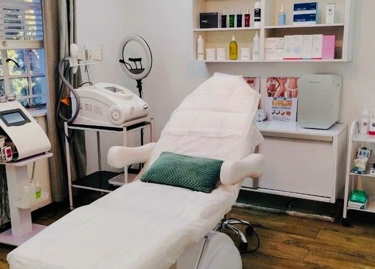 Relaxing treatment room at MANONO Aesthetics and Wellness Clinic, Johannesburg, Gauteng, ZA, highlighting spa amenities.