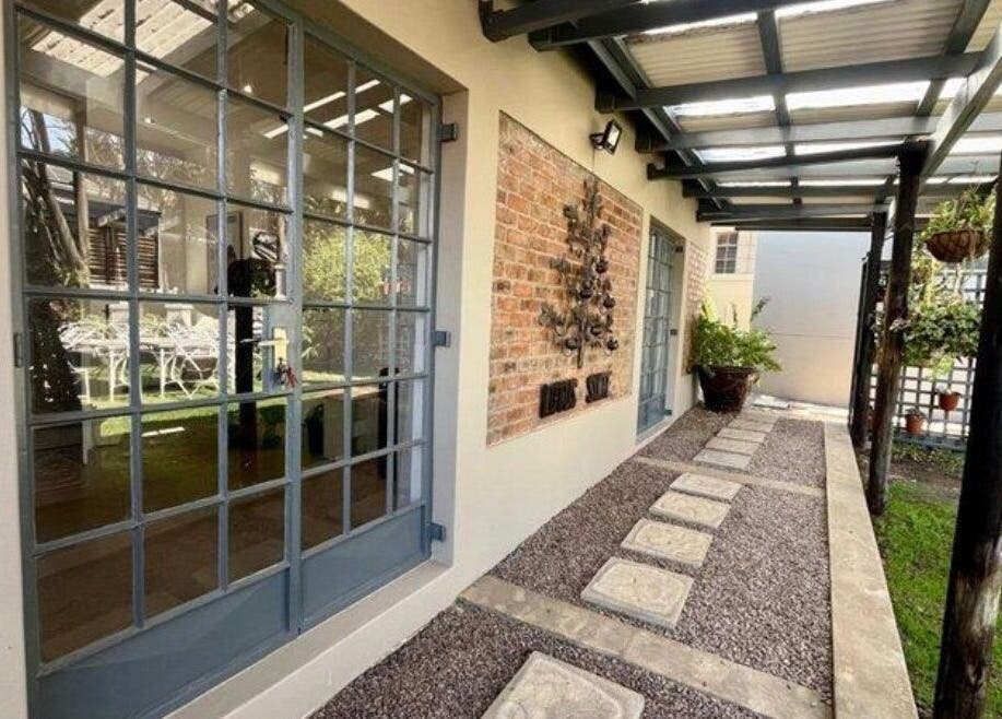 Modern courtyard at MANONO Aesthetics and Wellness Clinic, Johannesburg, Gauteng, ZA with stylish decor.