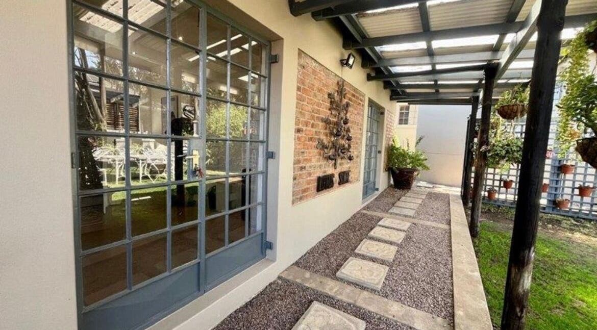 Modern courtyard at MANONO Aesthetics and Wellness Clinic, Johannesburg, Gauteng, ZA with stylish decor.
