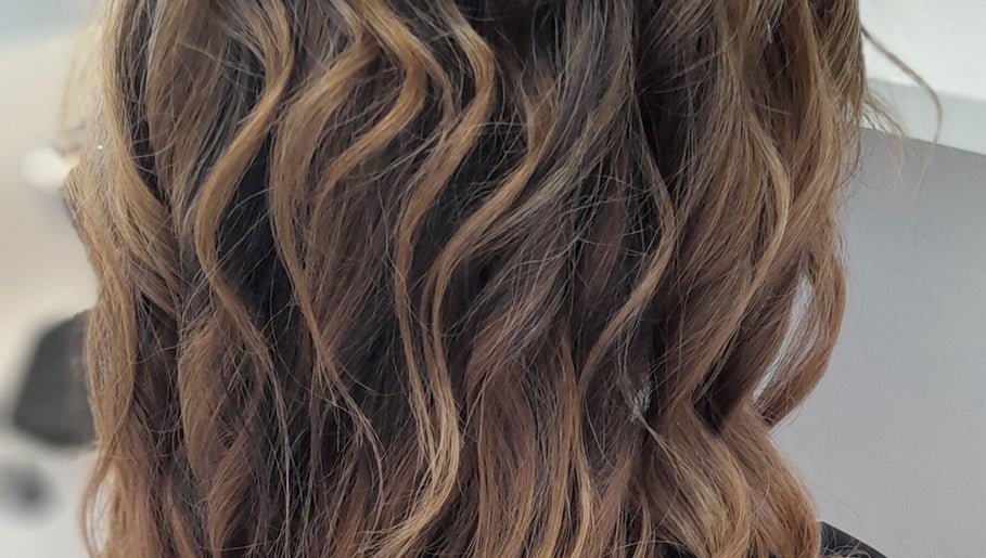 Elegant wavy hairstyle by Gold Coast Mobile Hair & Beauty in Southport, Queensland, AU.