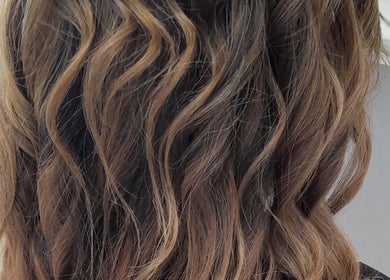 Elegant wavy hairstyle by Gold Coast Mobile Hair & Beauty in Southport, Queensland, AU.