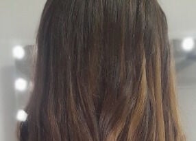 Elegant long hair styled by Gold Coast Mobile Hair & Beauty in Southport, Queensland, AU, showcasing vibrant shine.