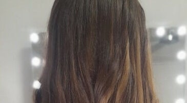 Elegant long hair styled by Gold Coast Mobile Hair & Beauty in Southport, Queensland, AU, showcasing vibrant shine.