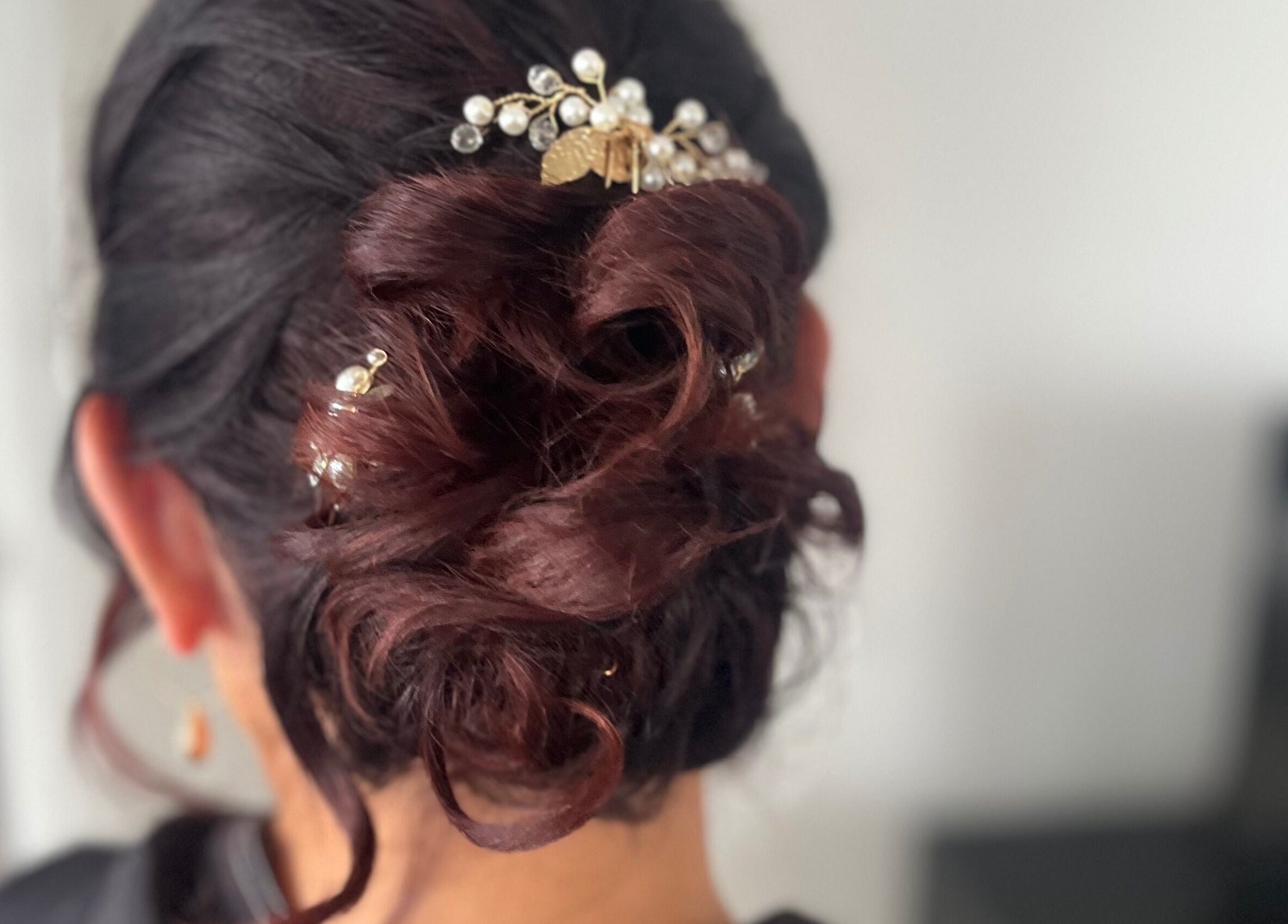 Elegant bridal updo with pearl hairpins at Jamie Elle Hair & Makeup, Southport, Queensland, AU.