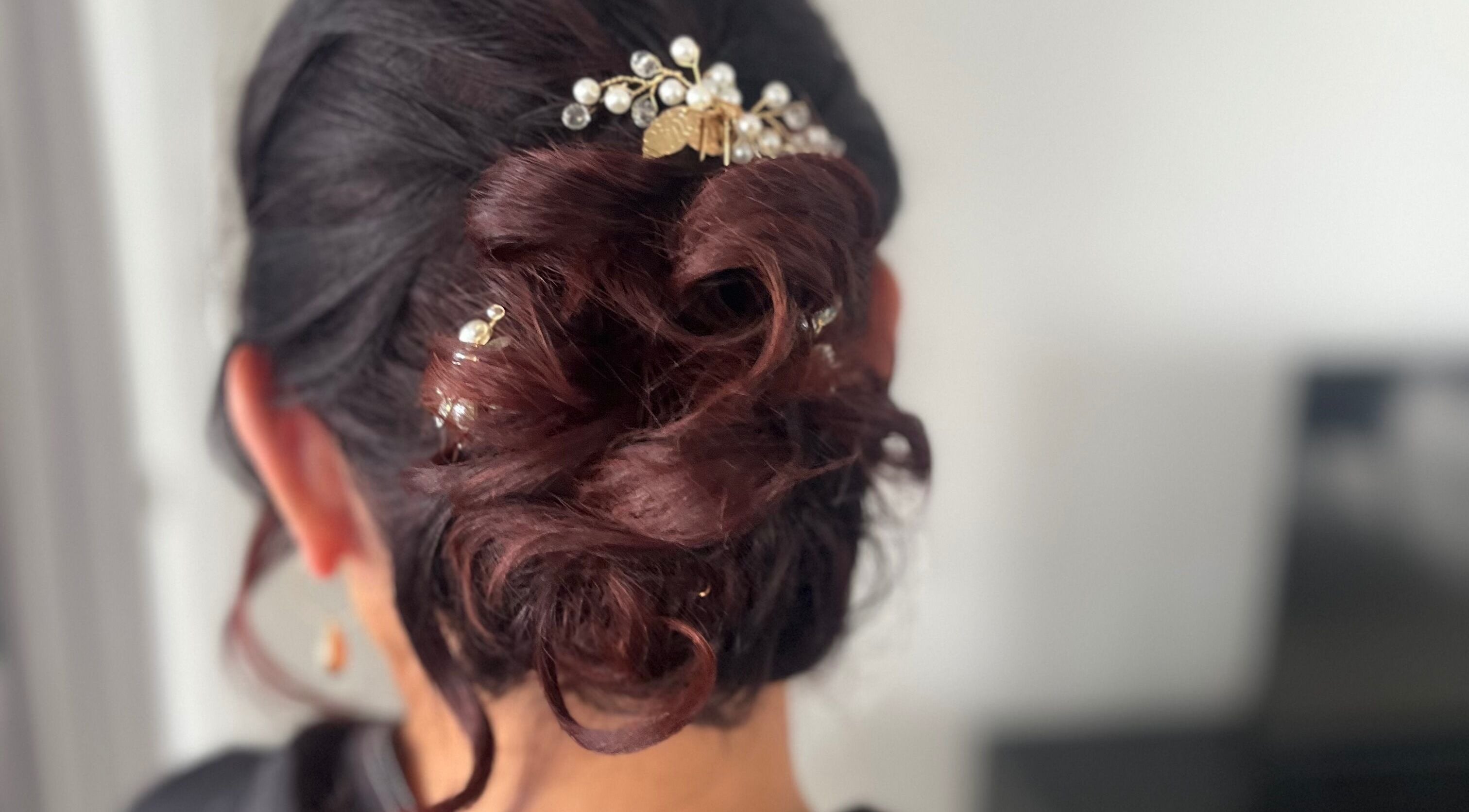 Elegant bridal updo with pearl hairpins at Jamie Elle Hair & Makeup, Southport, Queensland, AU.