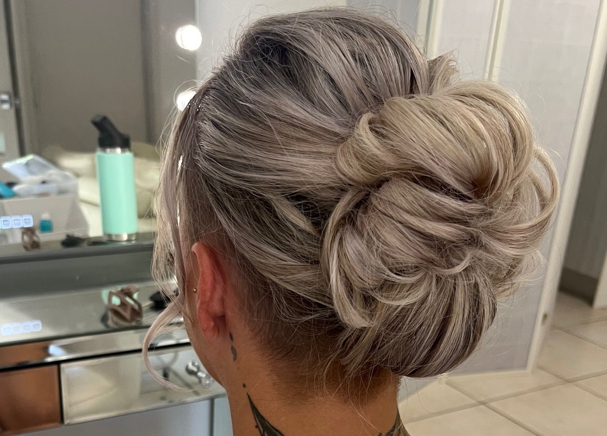 Stylish updo hairstyle from Jamie Elle Hair & Makeup (Mobile) in Southport, Queensland, AU.