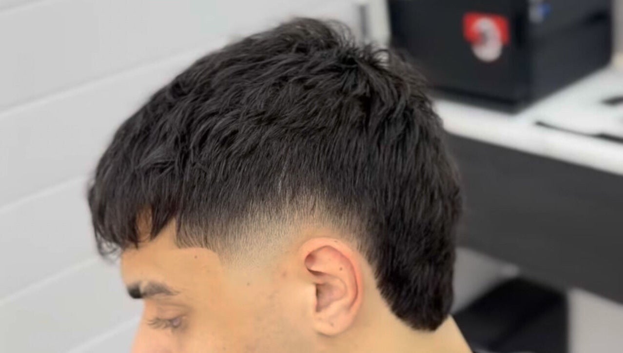 Close-up of a trendy haircut at Matteo Cau, Croydon, South Australia, AU, showcasing precision styling.