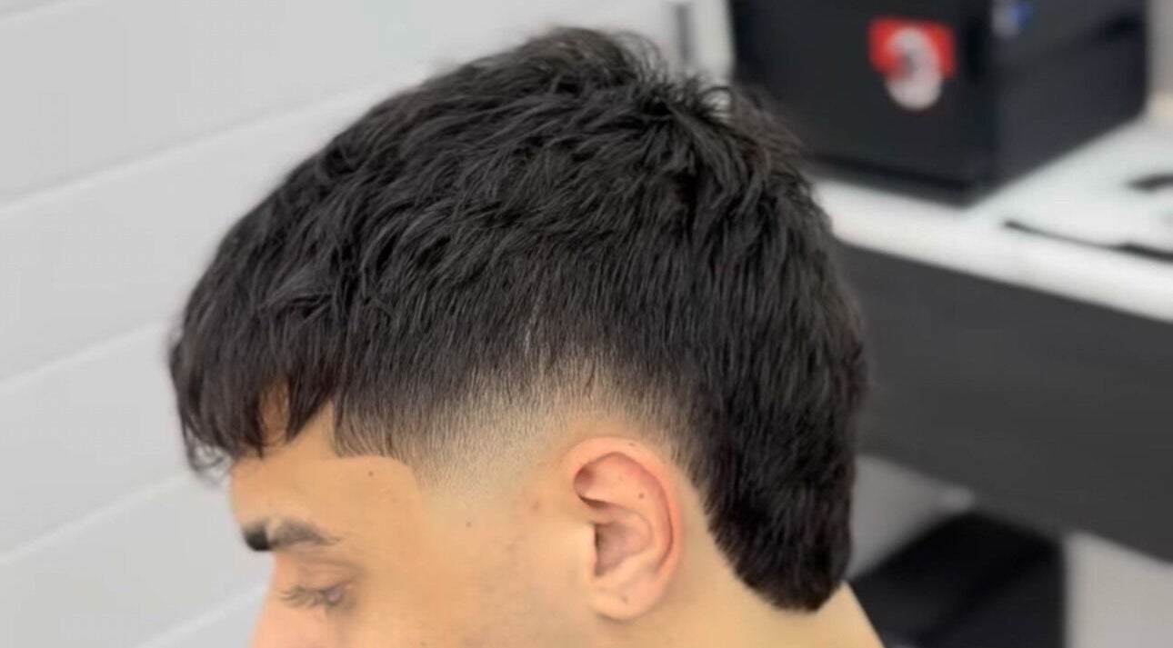 Close-up of a trendy haircut at Matteo Cau, Croydon, South Australia, AU, showcasing precision styling.