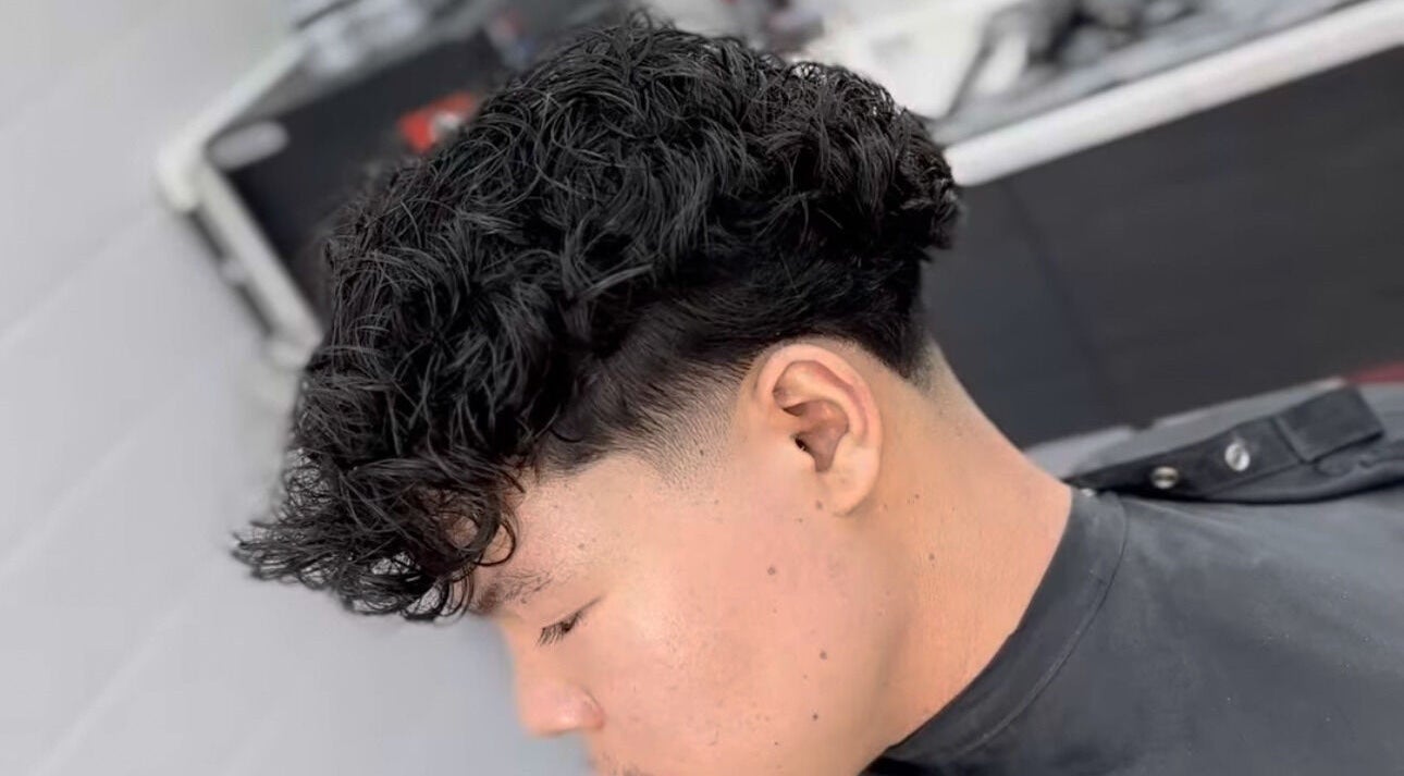 Stylish curly fade haircut at Matteo Cau, Croydon, South Australia, AU.