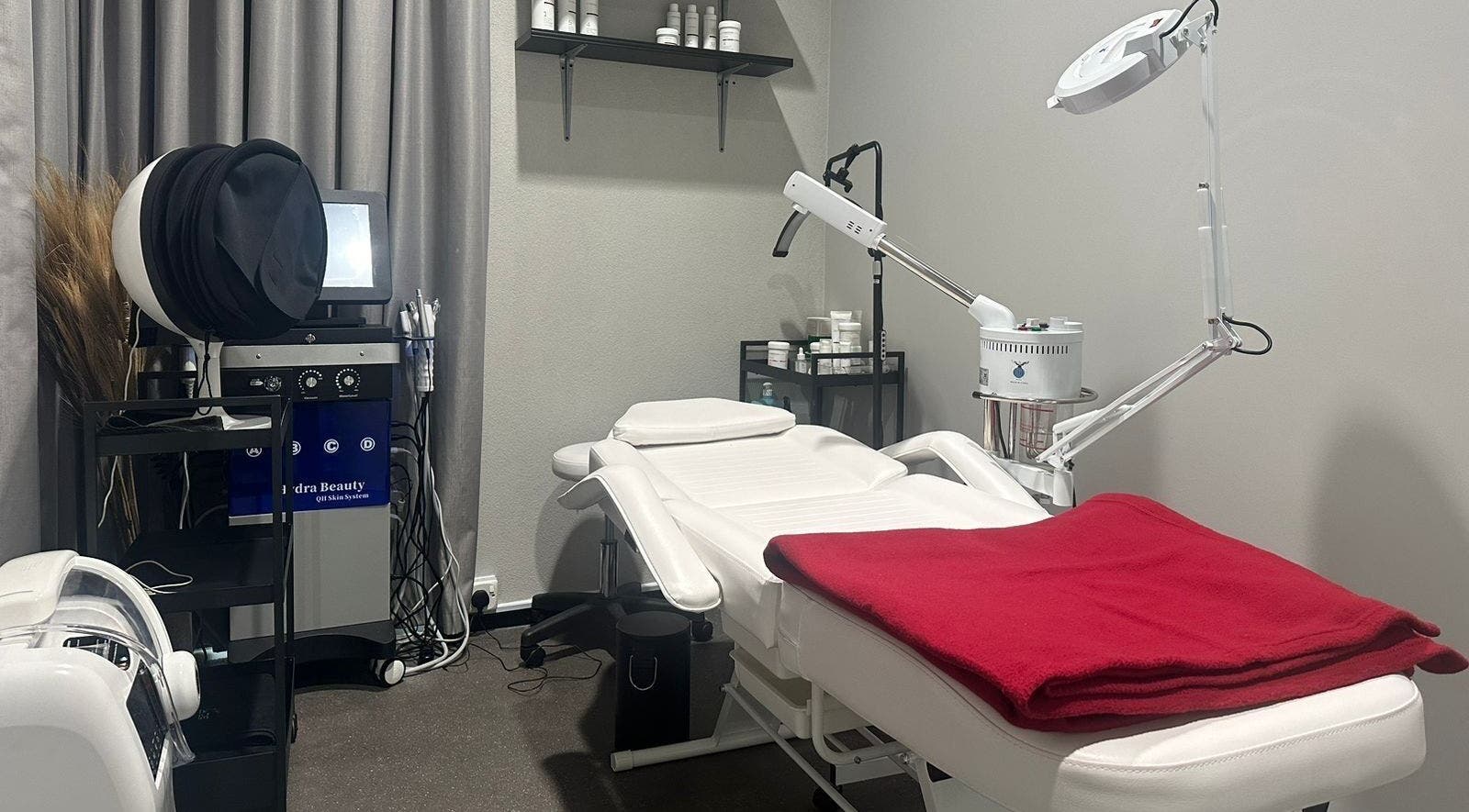Modern treatment room at My Face, Riyadh, Riyadh Province, SA, featuring a spa bed and skincare equipment.